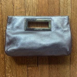 Authentic Michael Kors silver leather clutch